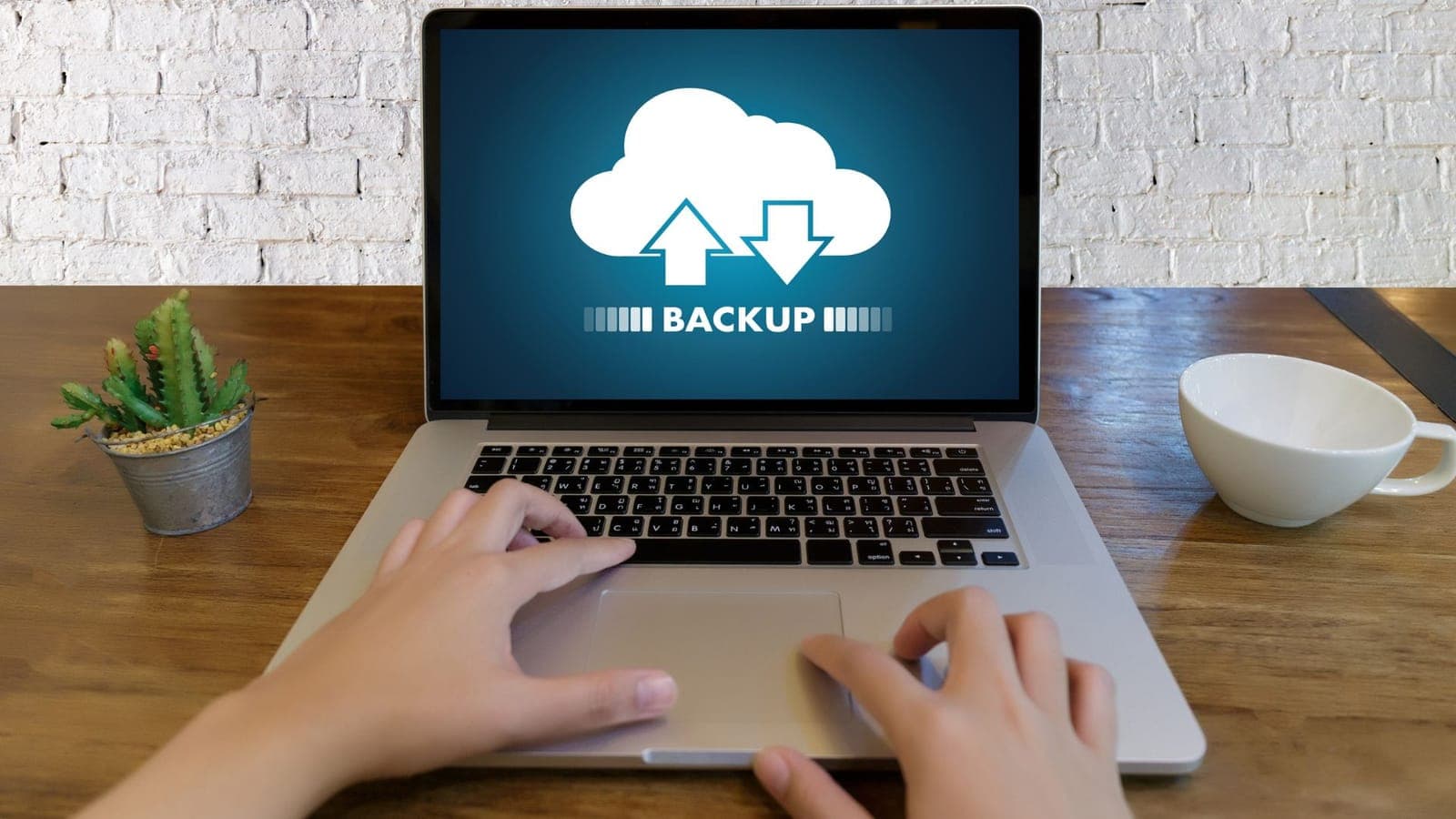 Data backup running on a laptop to recover from ransomware